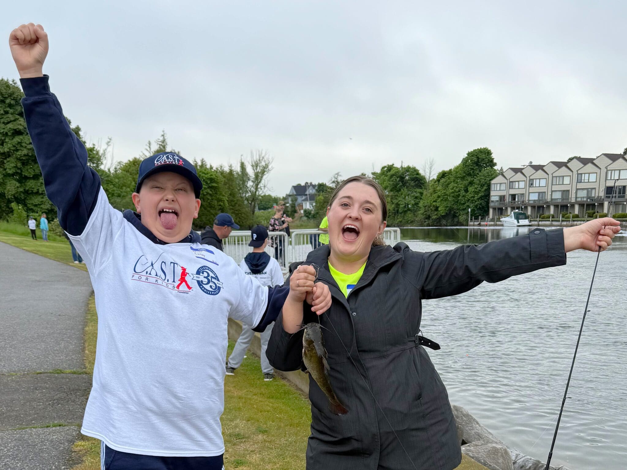 young boy showing off fish at Cheboygan