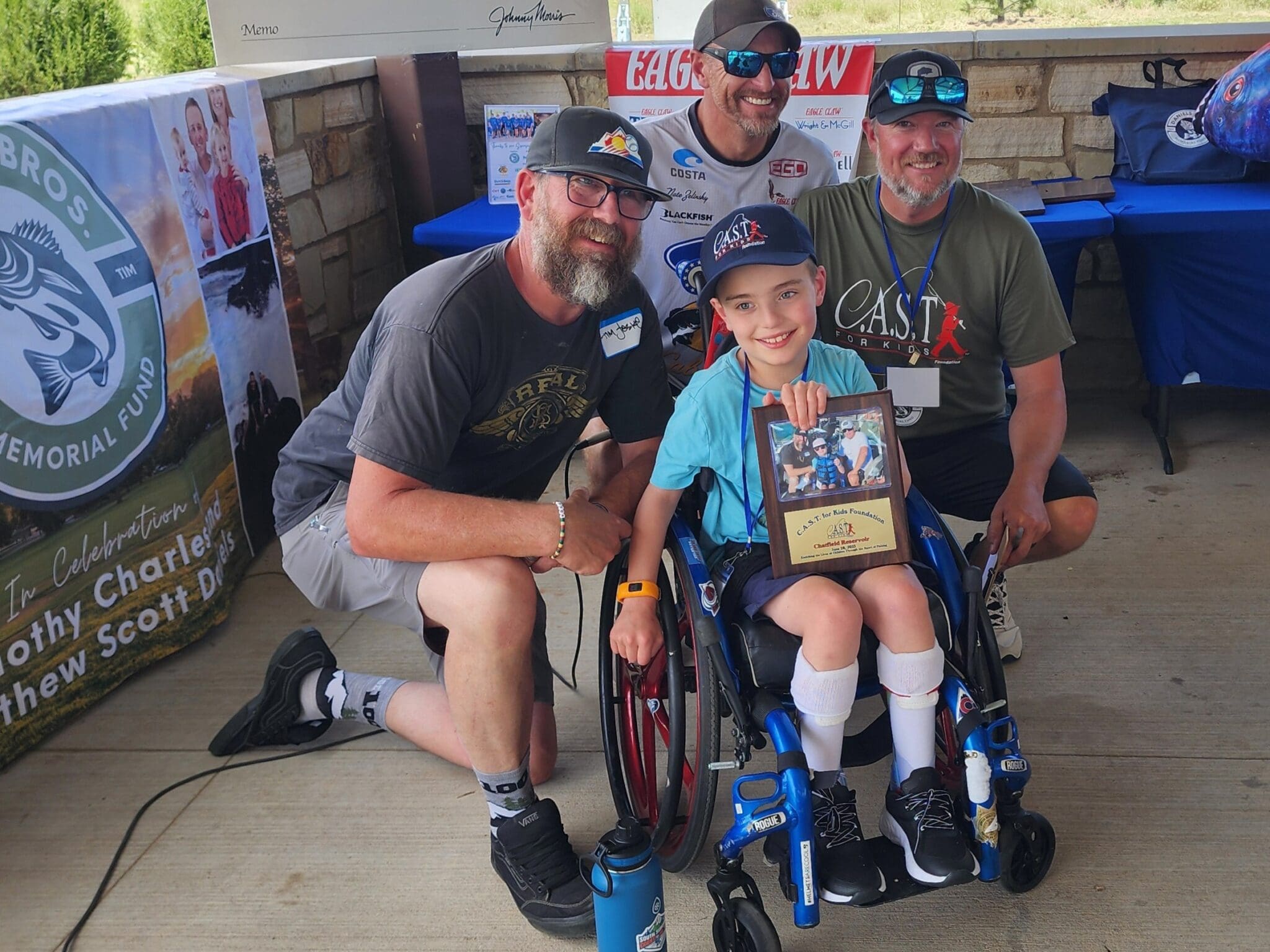 young child in wheelchair at chatfield reservoir