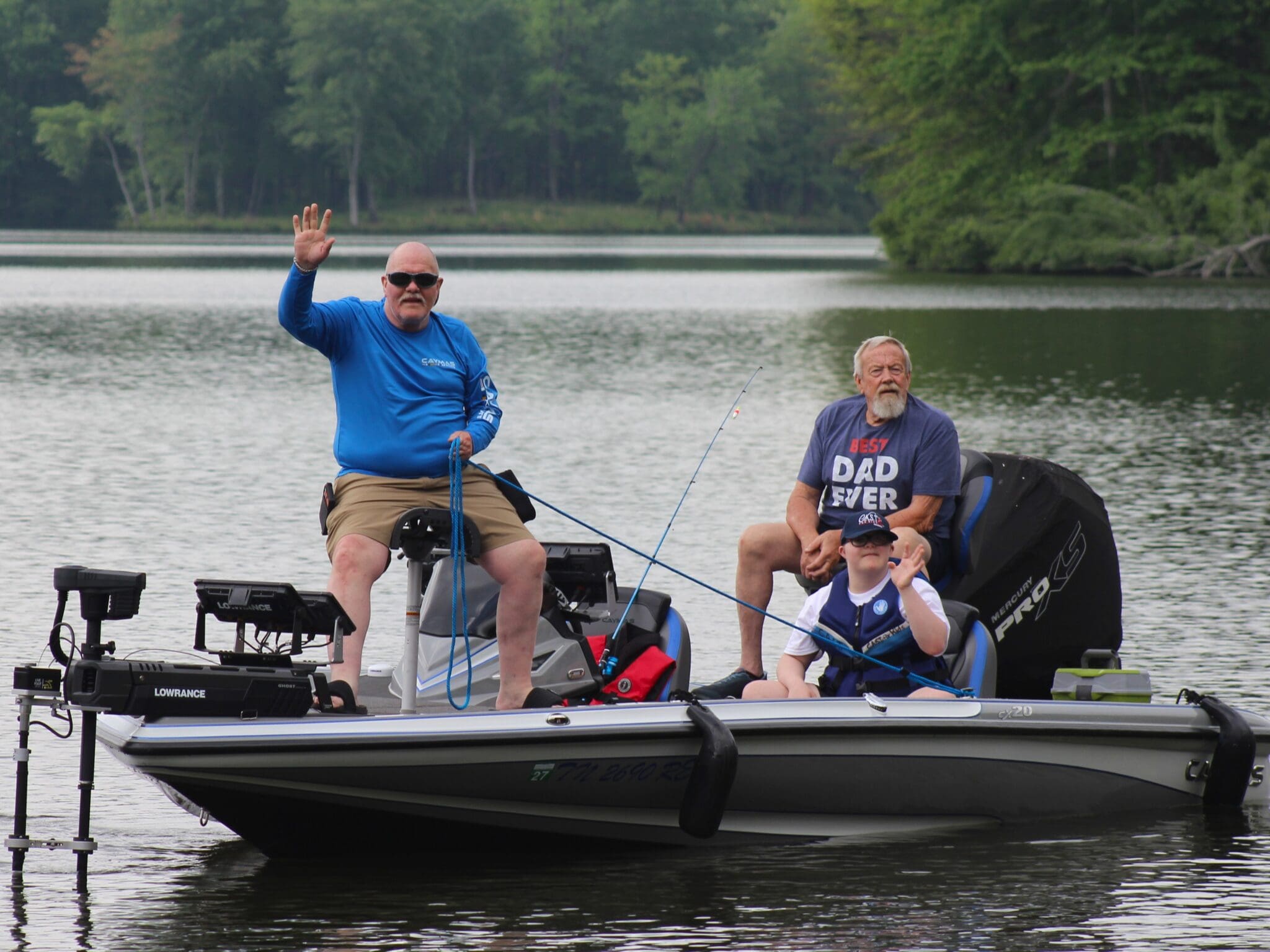 child in wheelchair fishing at indian lake