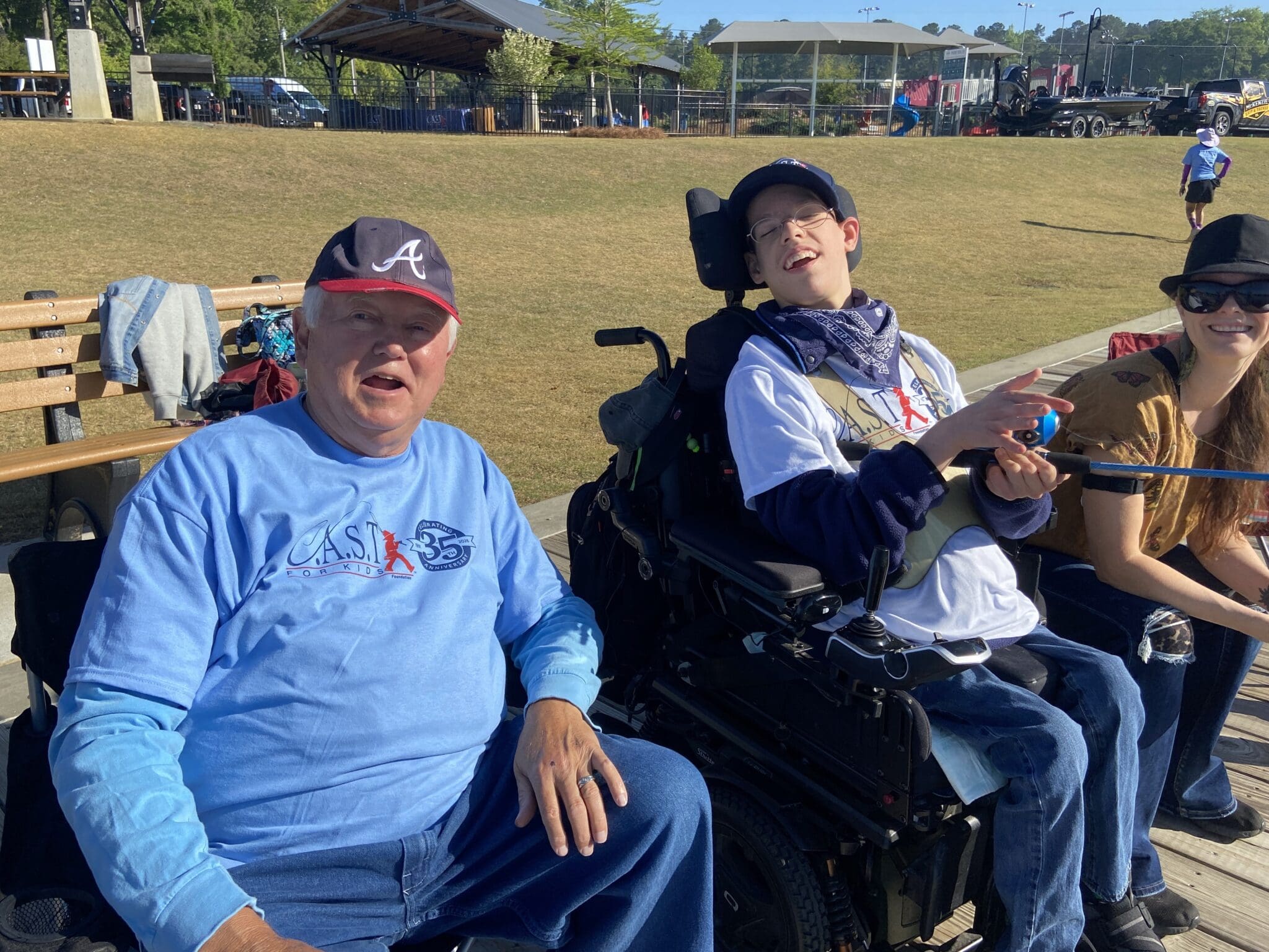 volunteer and participant with a fish