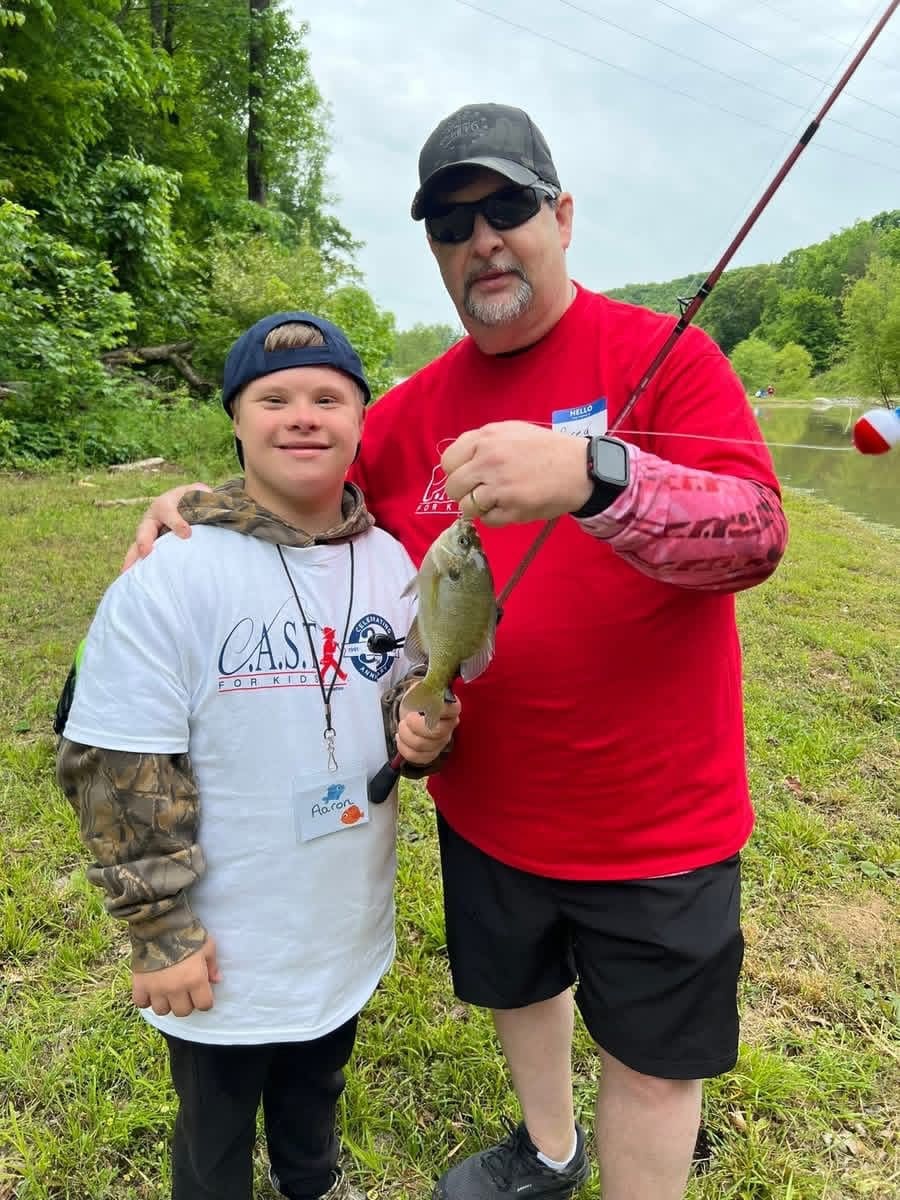 two people with fishing pole at chandler branch