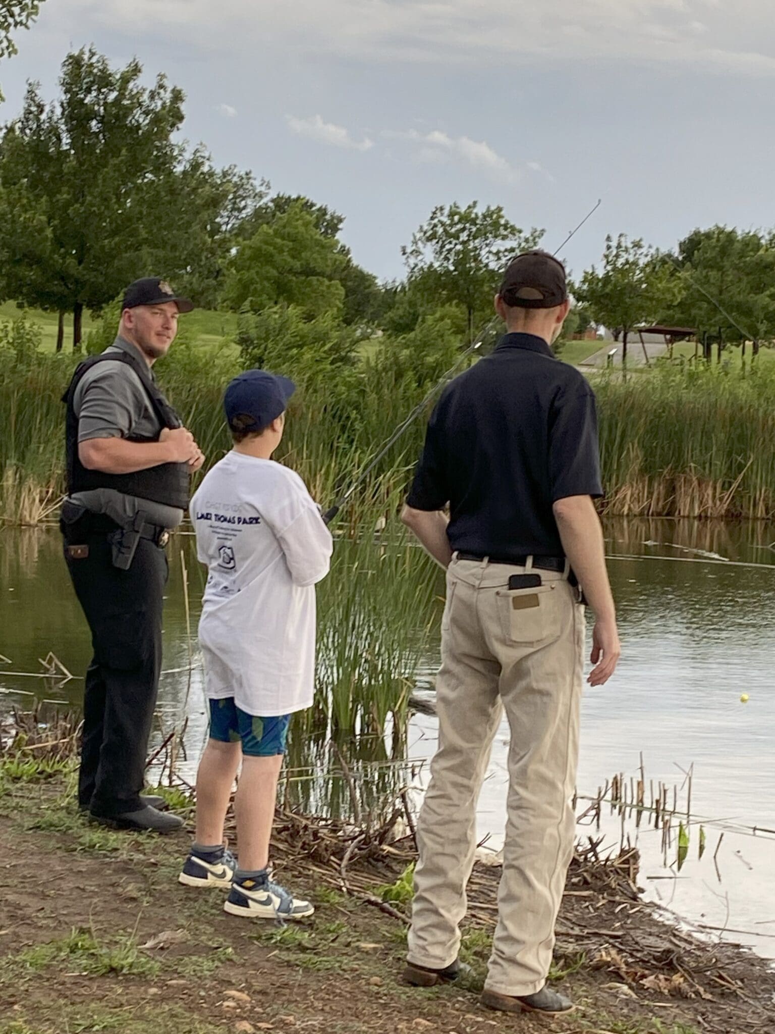 2 participants with fishing poles
