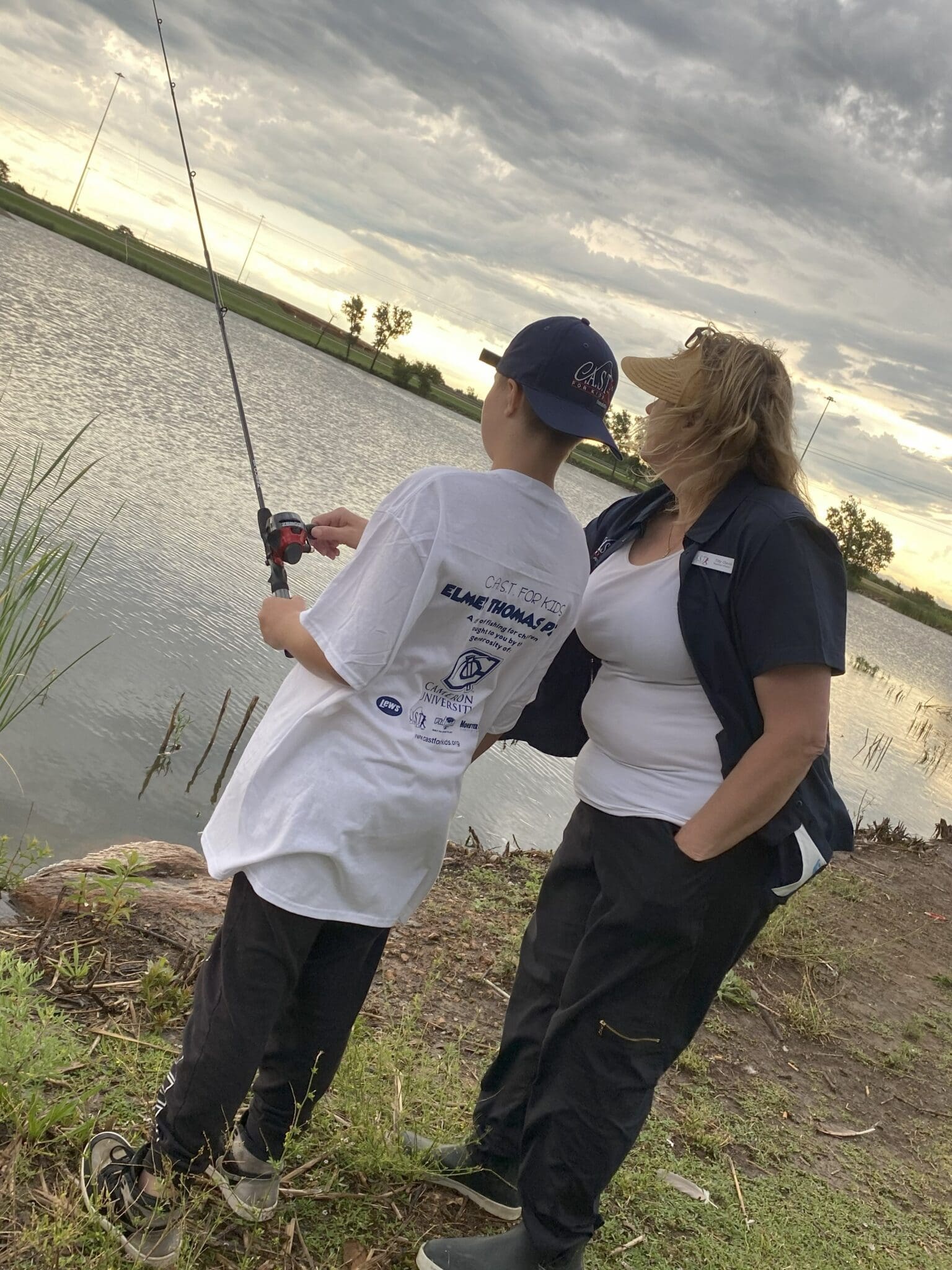 child catching fish in Cheboygan