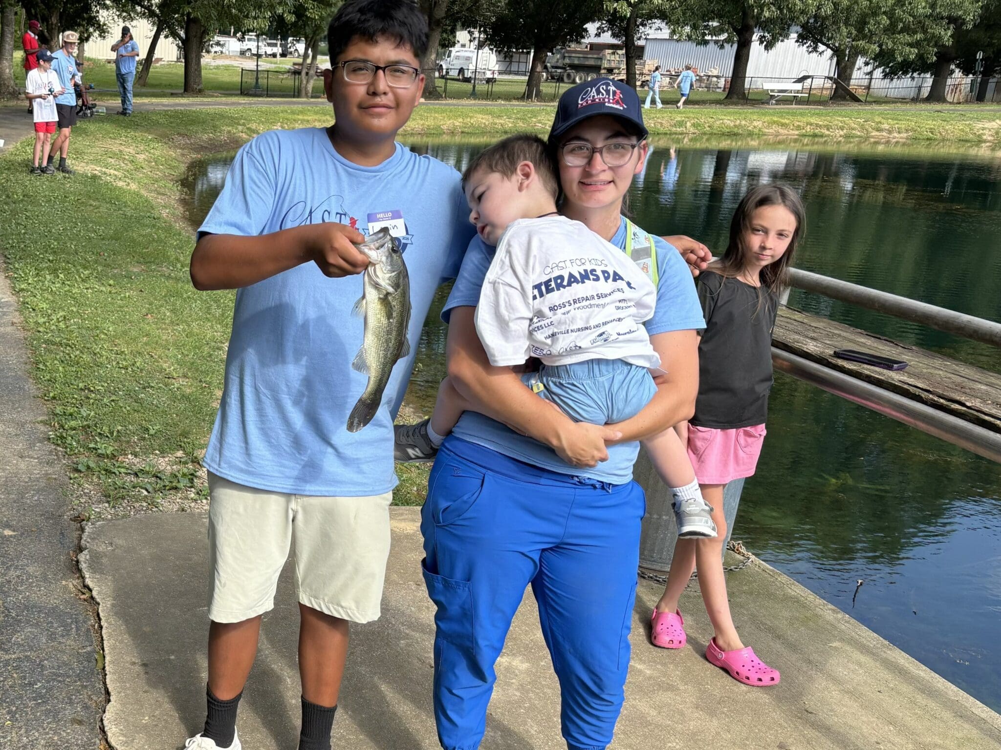 participant showing off fish at Saugatuck River