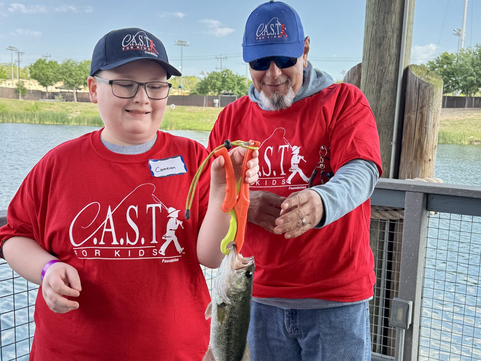 2 participants with fishing poles