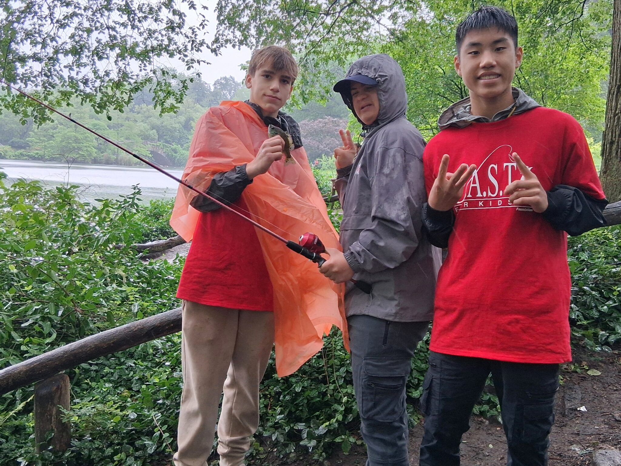 three participants at central park pond