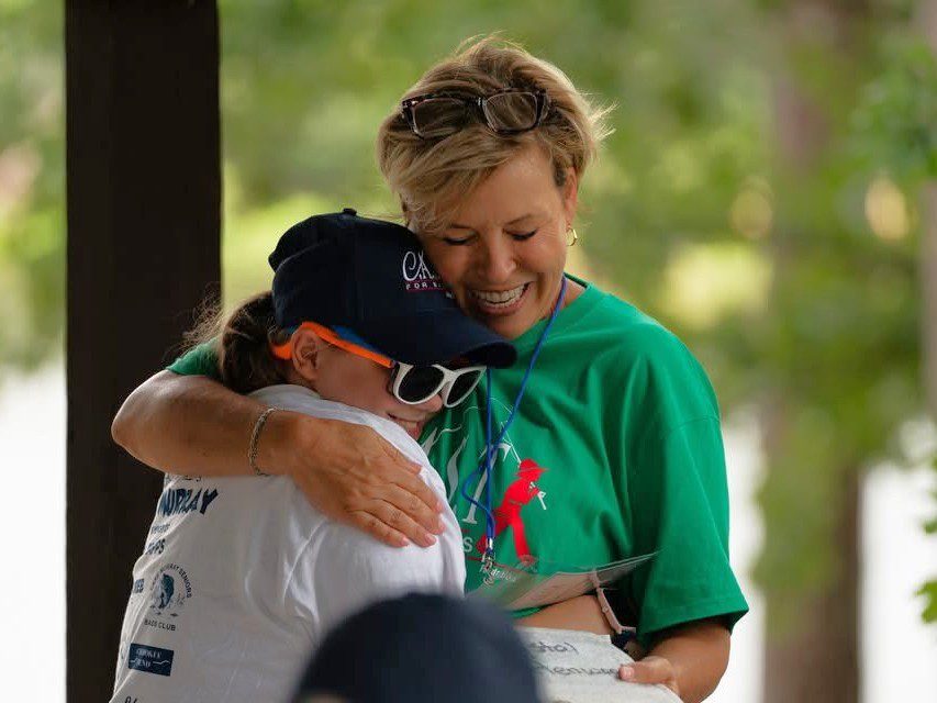two people hugging at lake murray sc