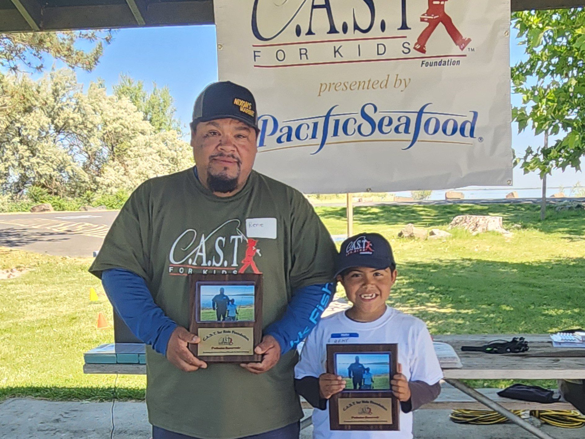 participants holding plaques at potholes reservoir