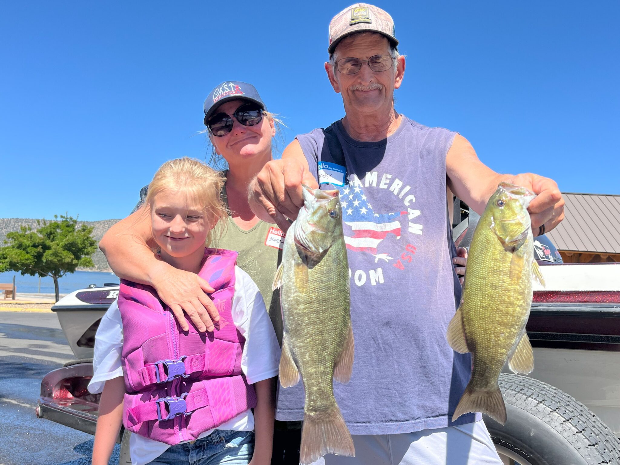 young girl showing fish at prineville reservoir