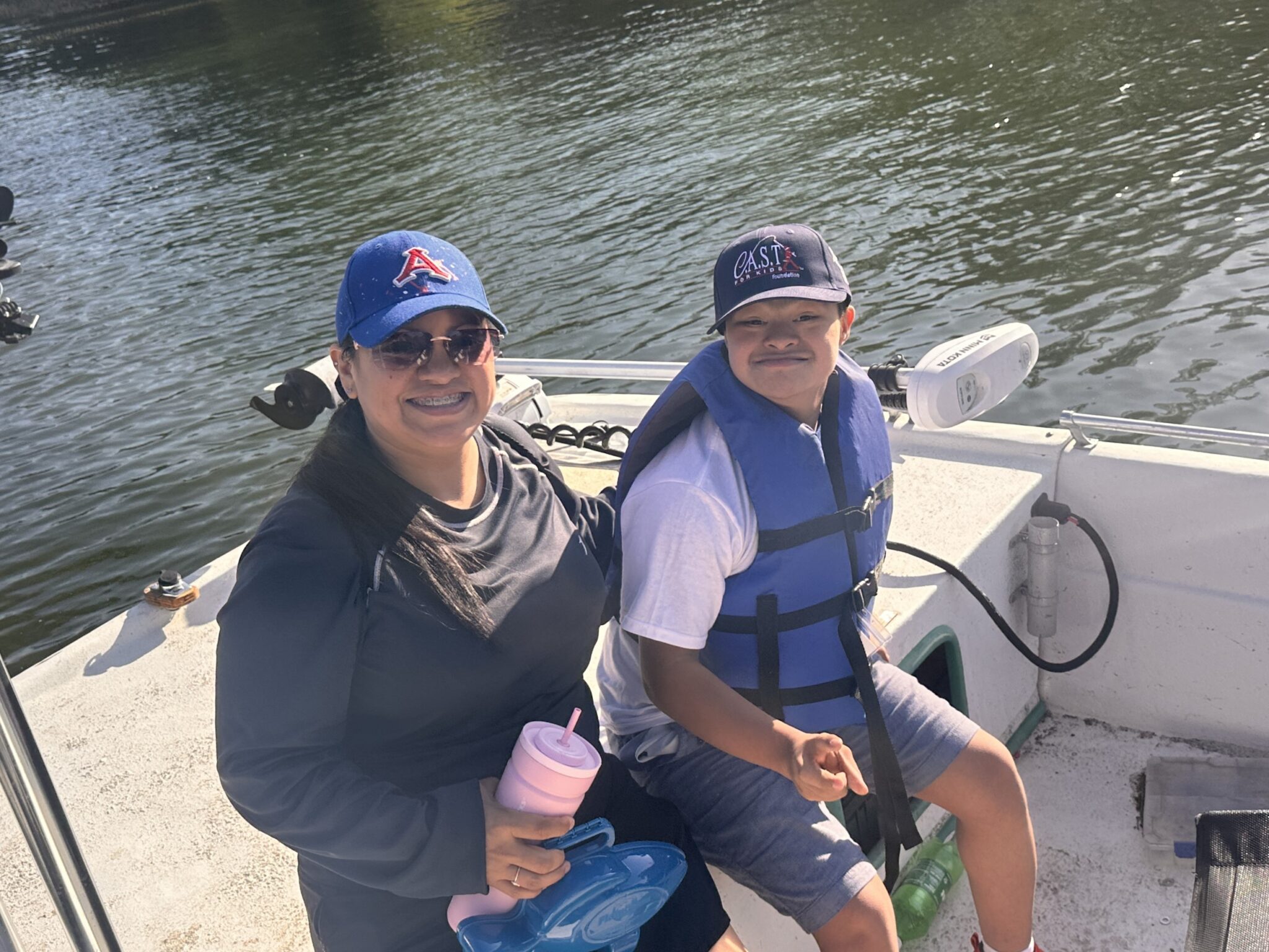 participants with fish on the boat