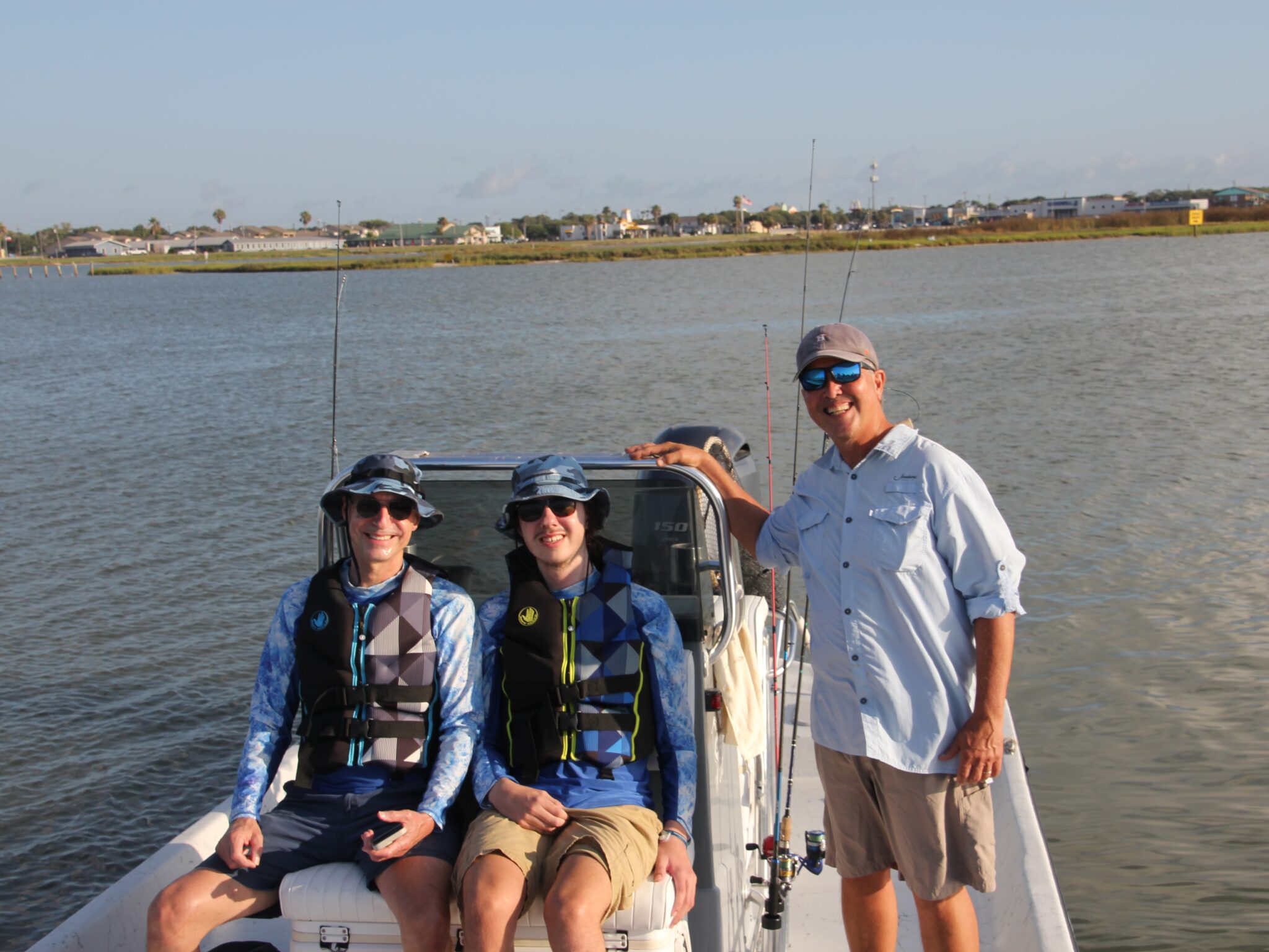 child showing off fish at rockport beach