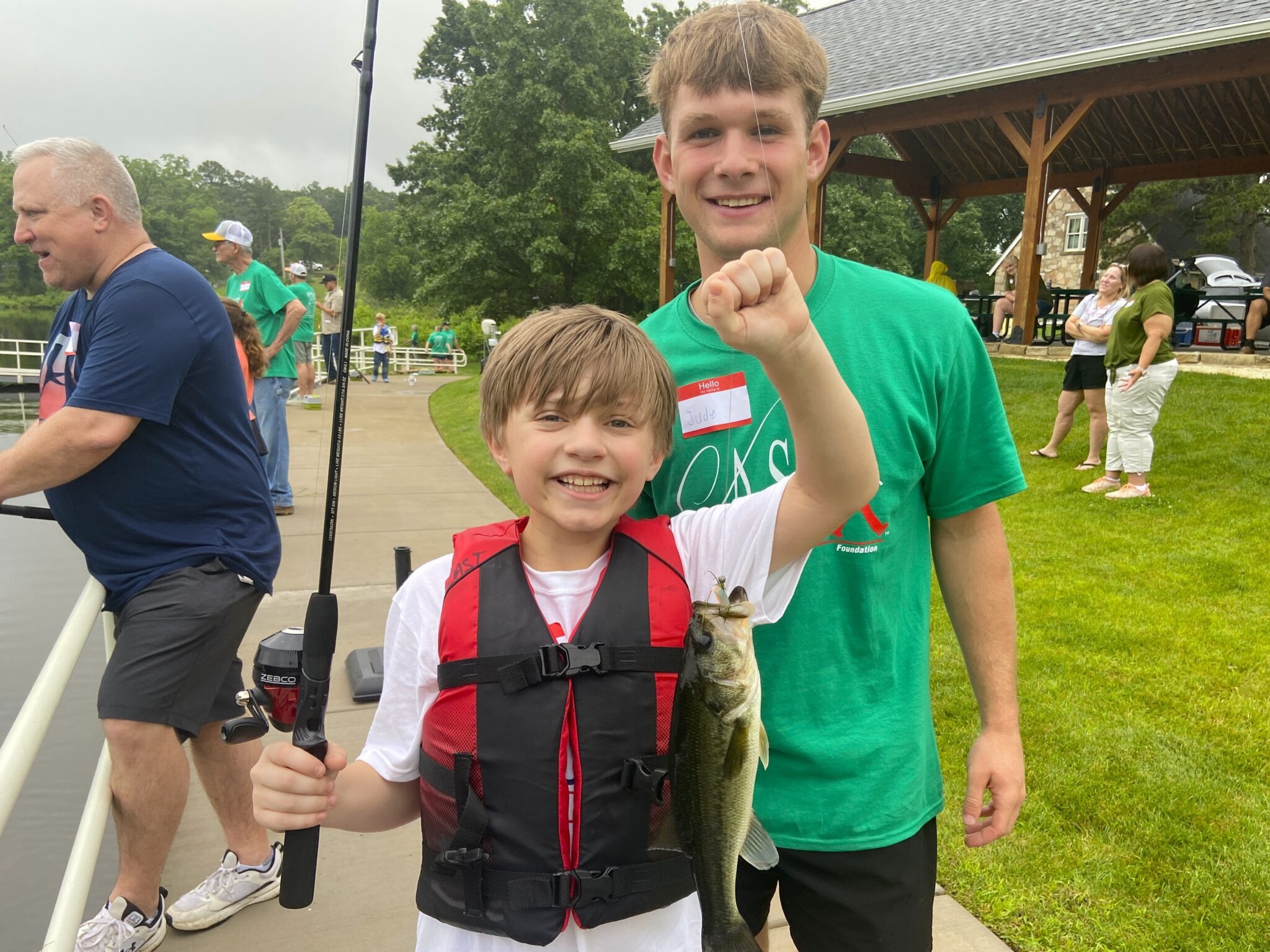 two young boys holding a fish at Kemp Lake