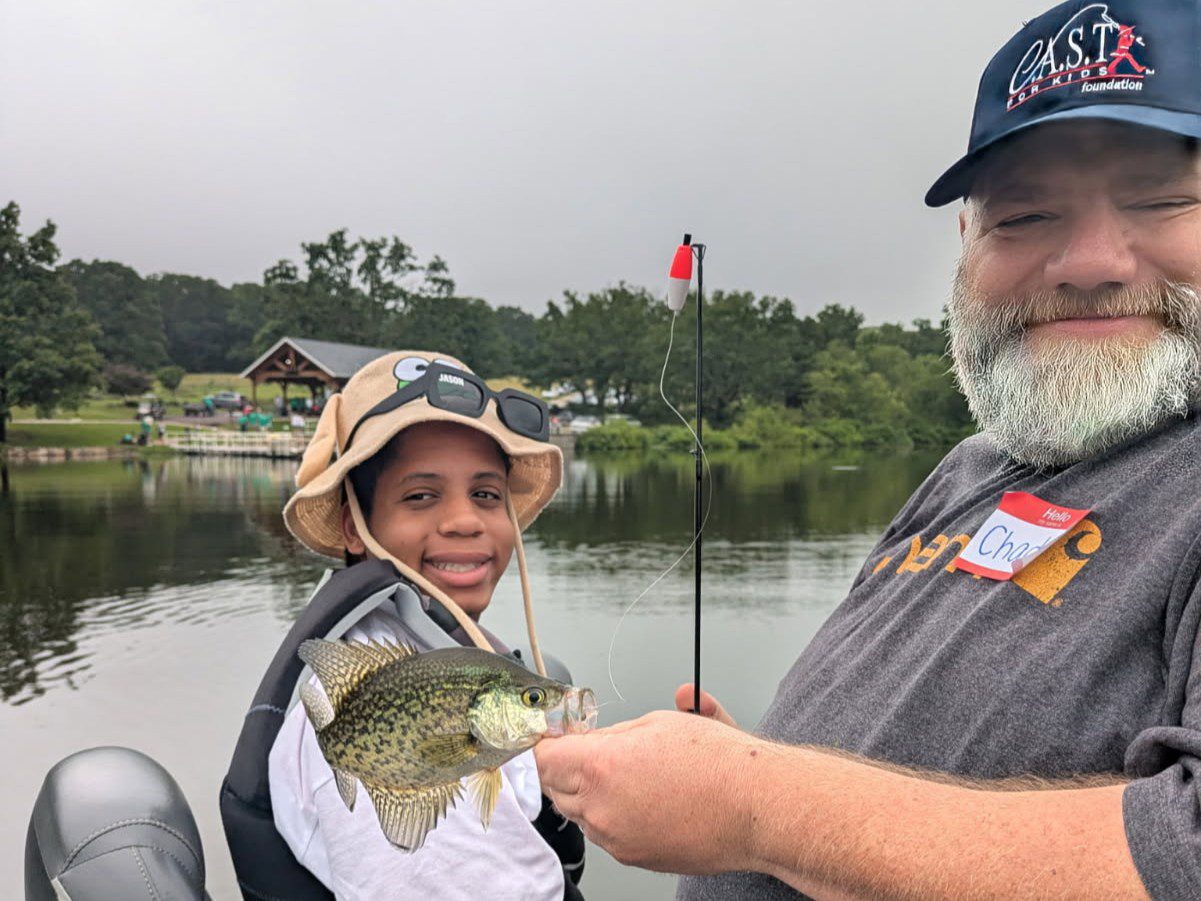 bearded man with fish at Kemp Lake