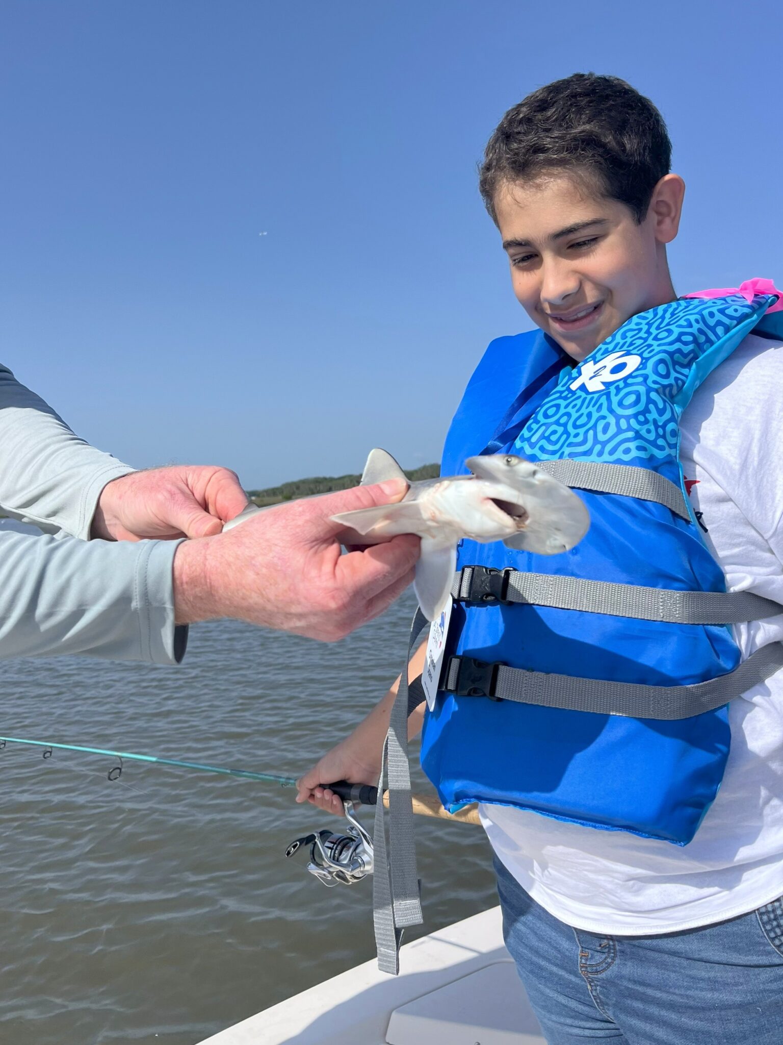 person holding fish at st johns county