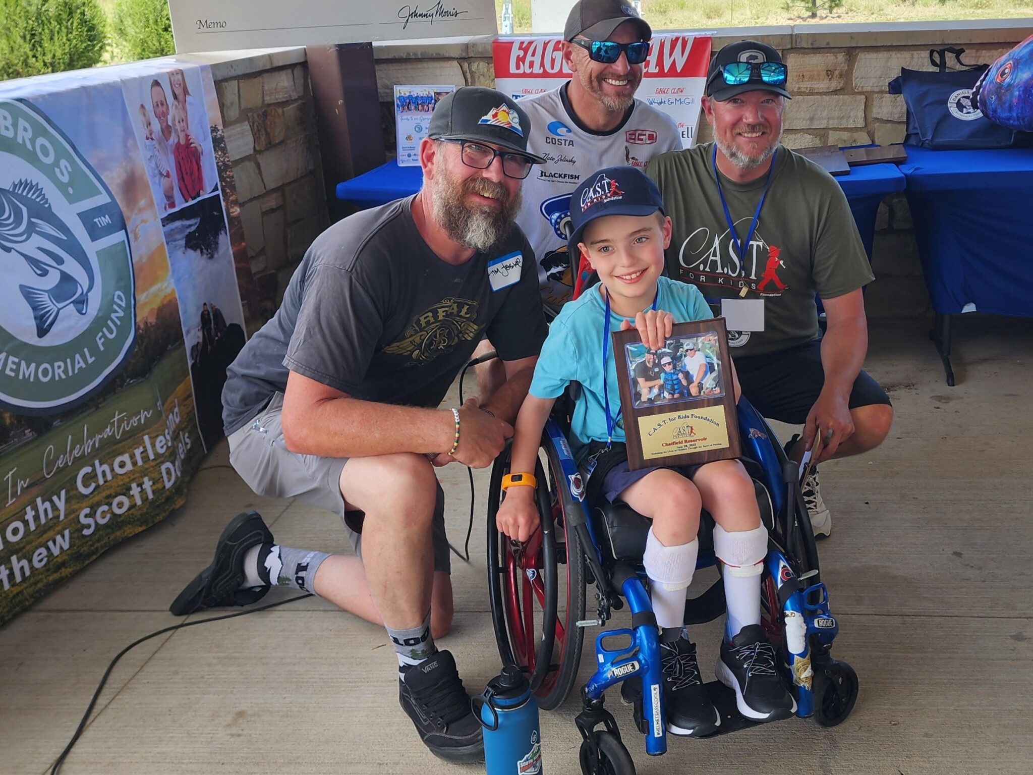 young child in wheelchair at chatfield reservoir