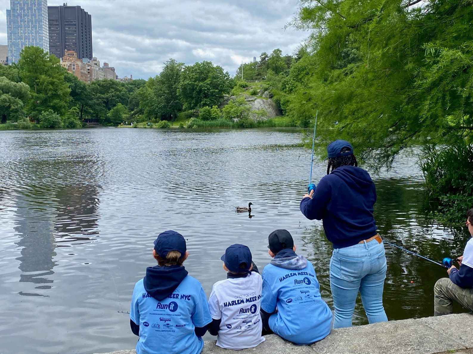 people fishing at harlem meer