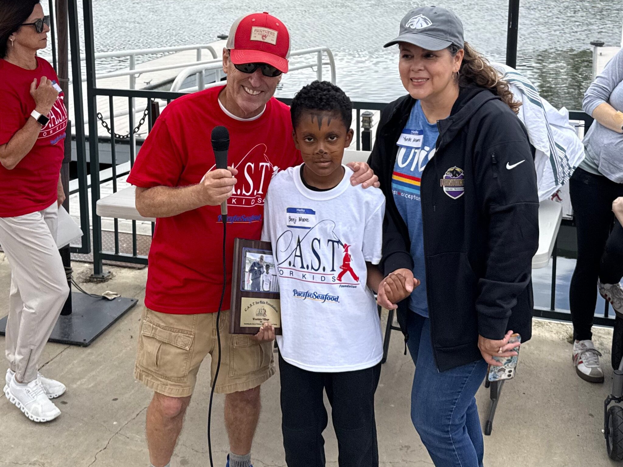 participant with two adults at west lake village