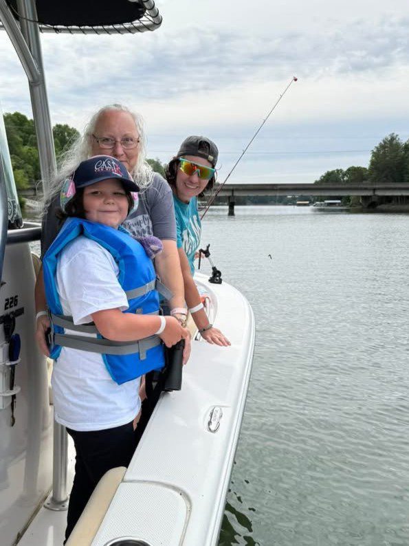 people on boat at lake hickory
