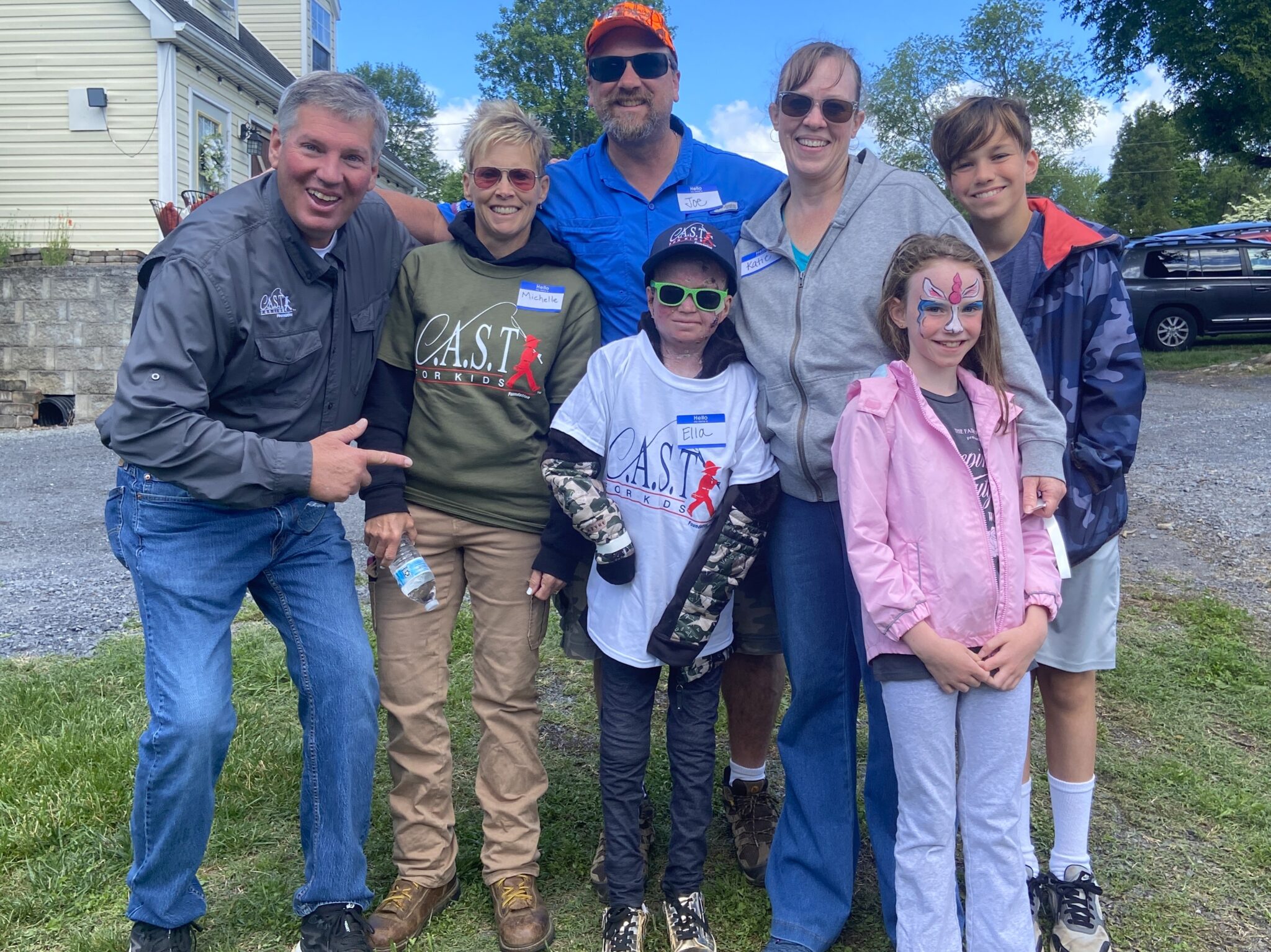 seven people getting photo at spotted dog pond