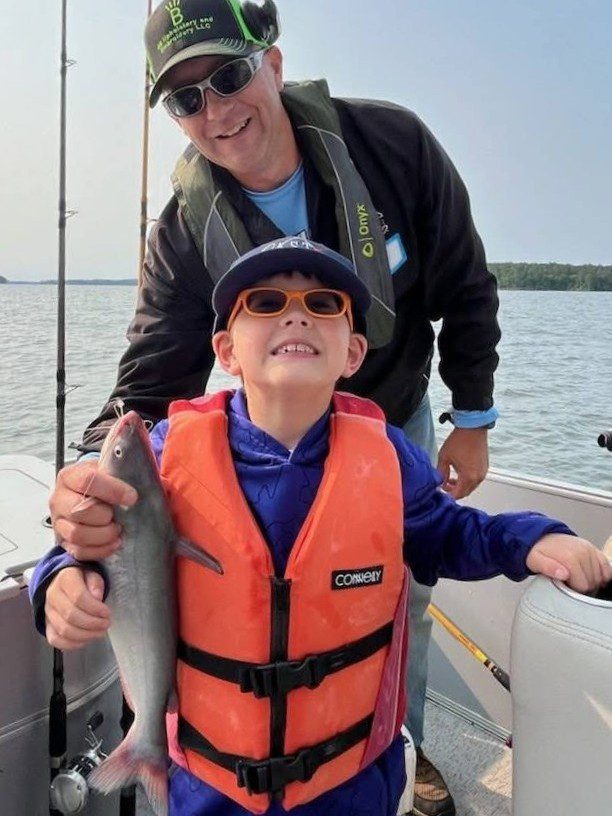 young child with fish at lake thurmond