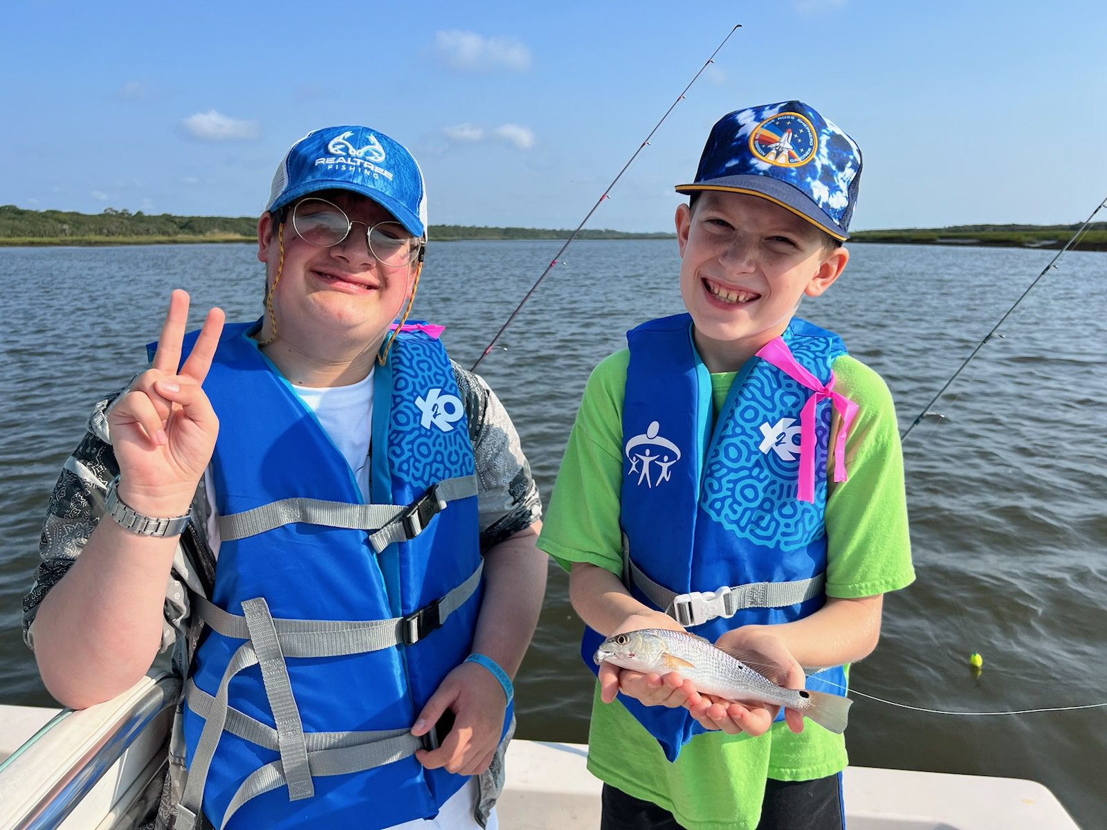 StJohns1 two kids fishing at Northeast Florida Marlin Club