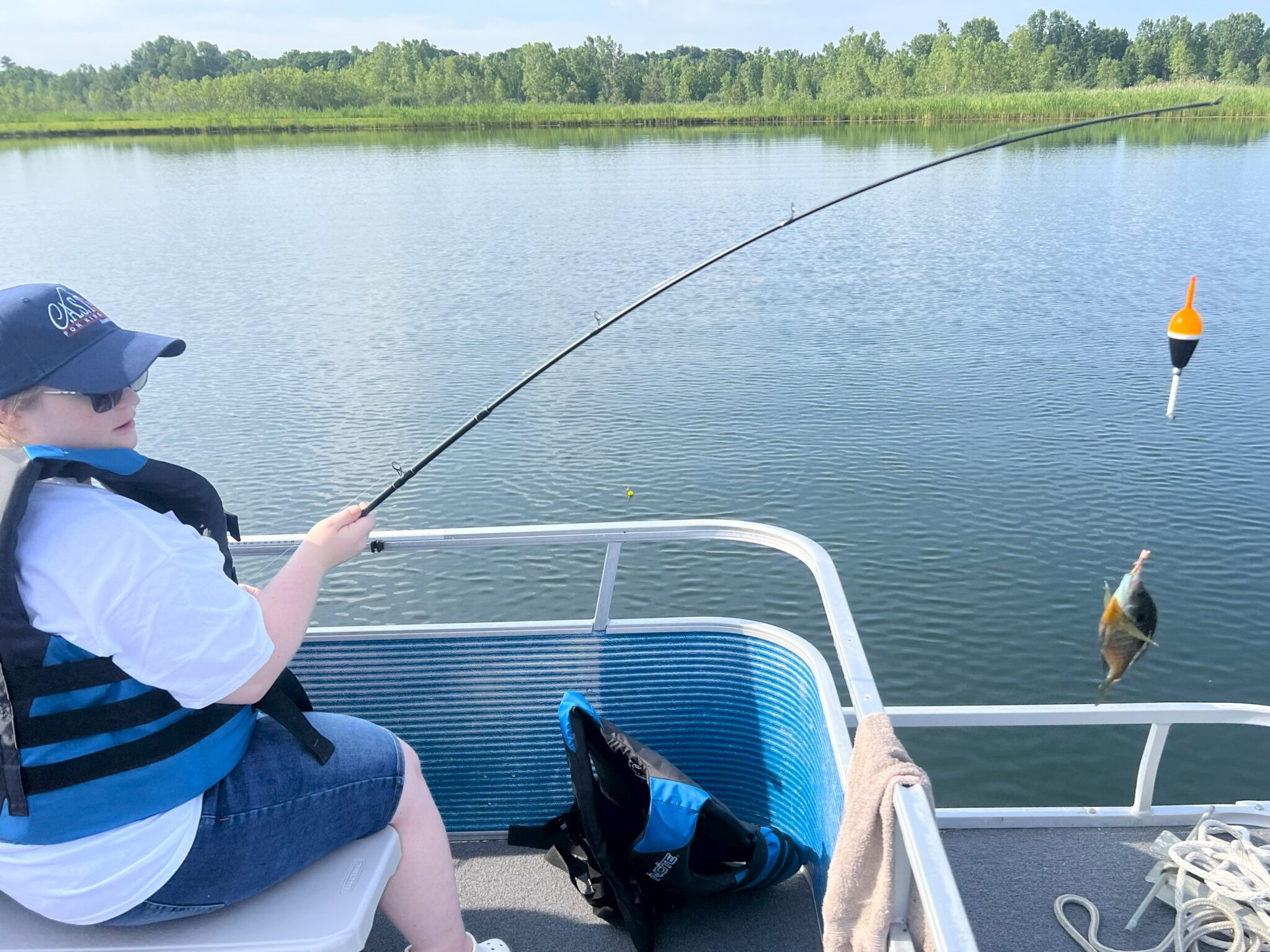 fishing from a boat at Happy Day