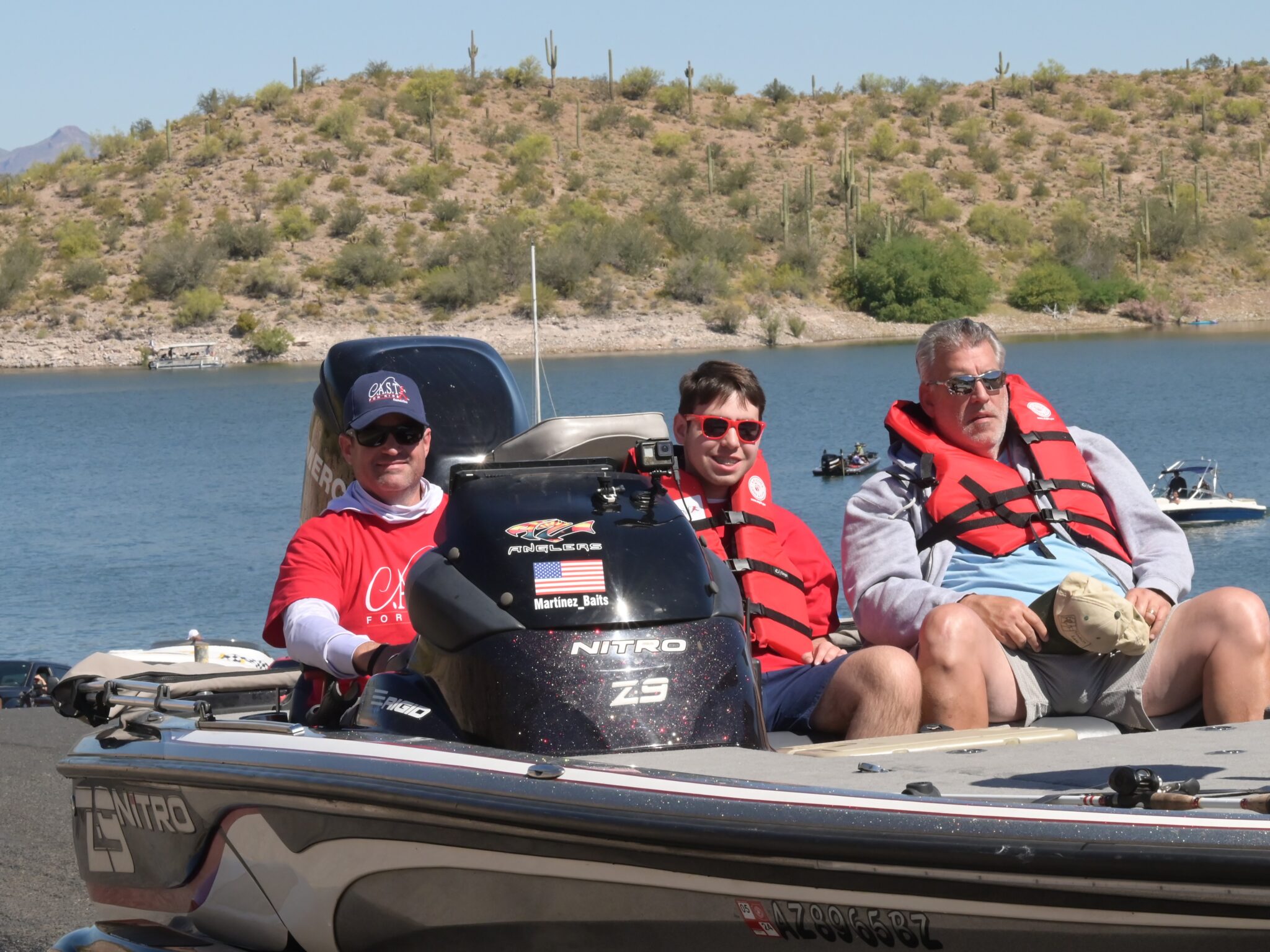 three people on boat at lake pleasant