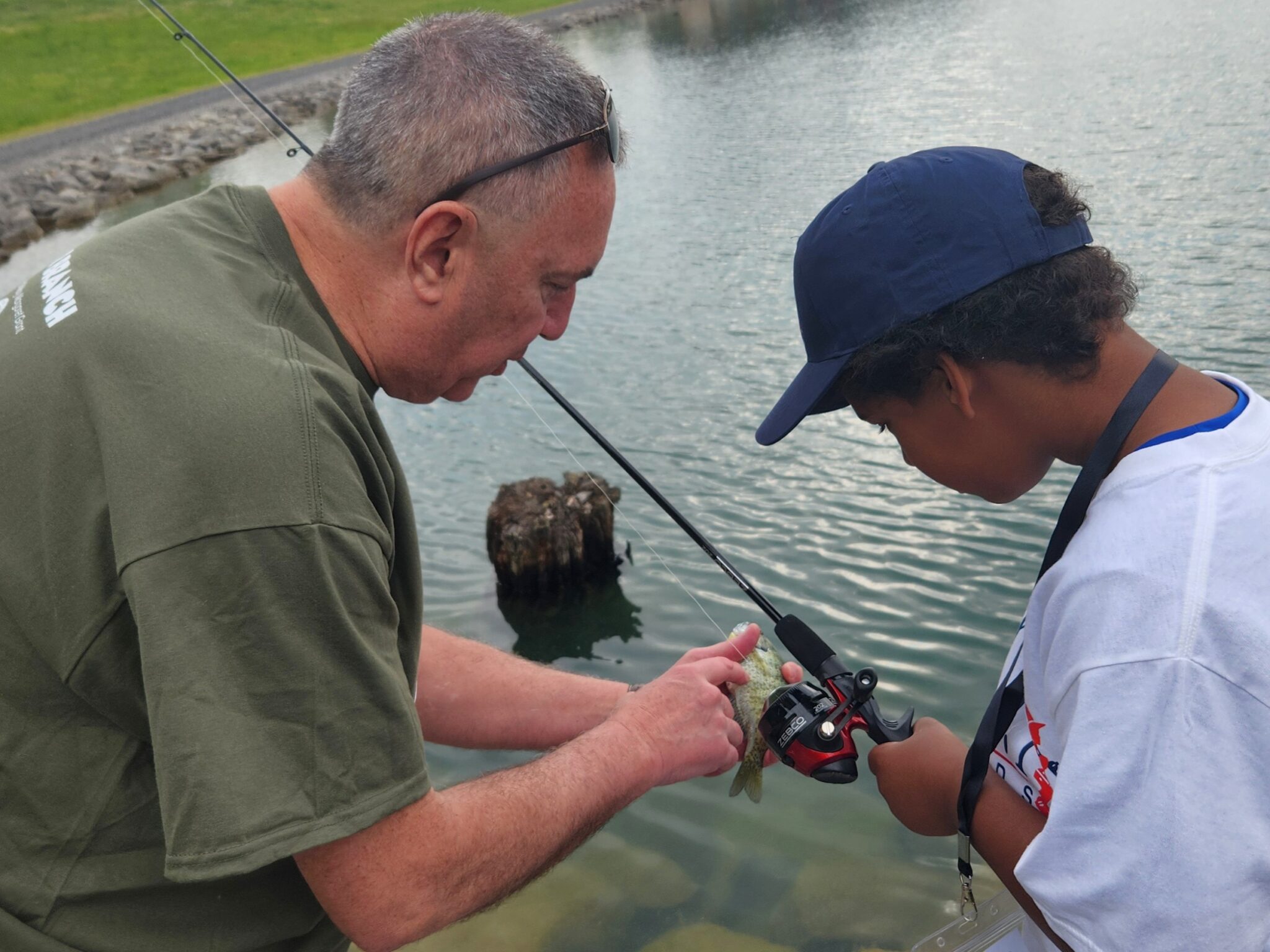 Saugatuck River participant holding fish