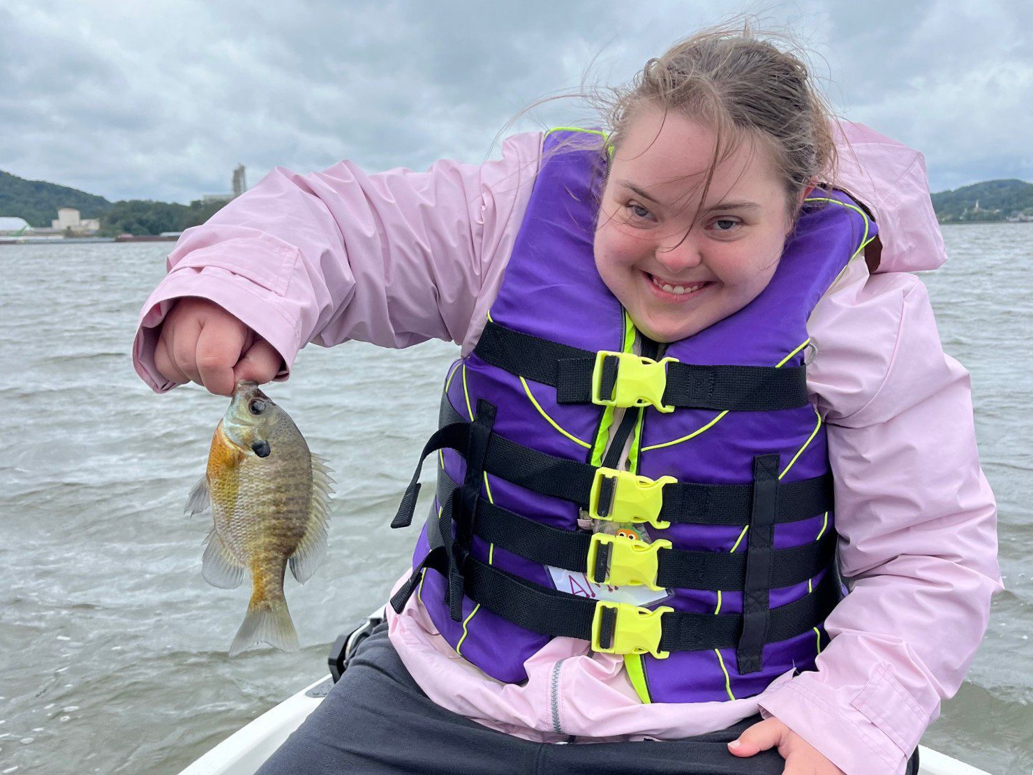 Saugatuck River participant holding fish